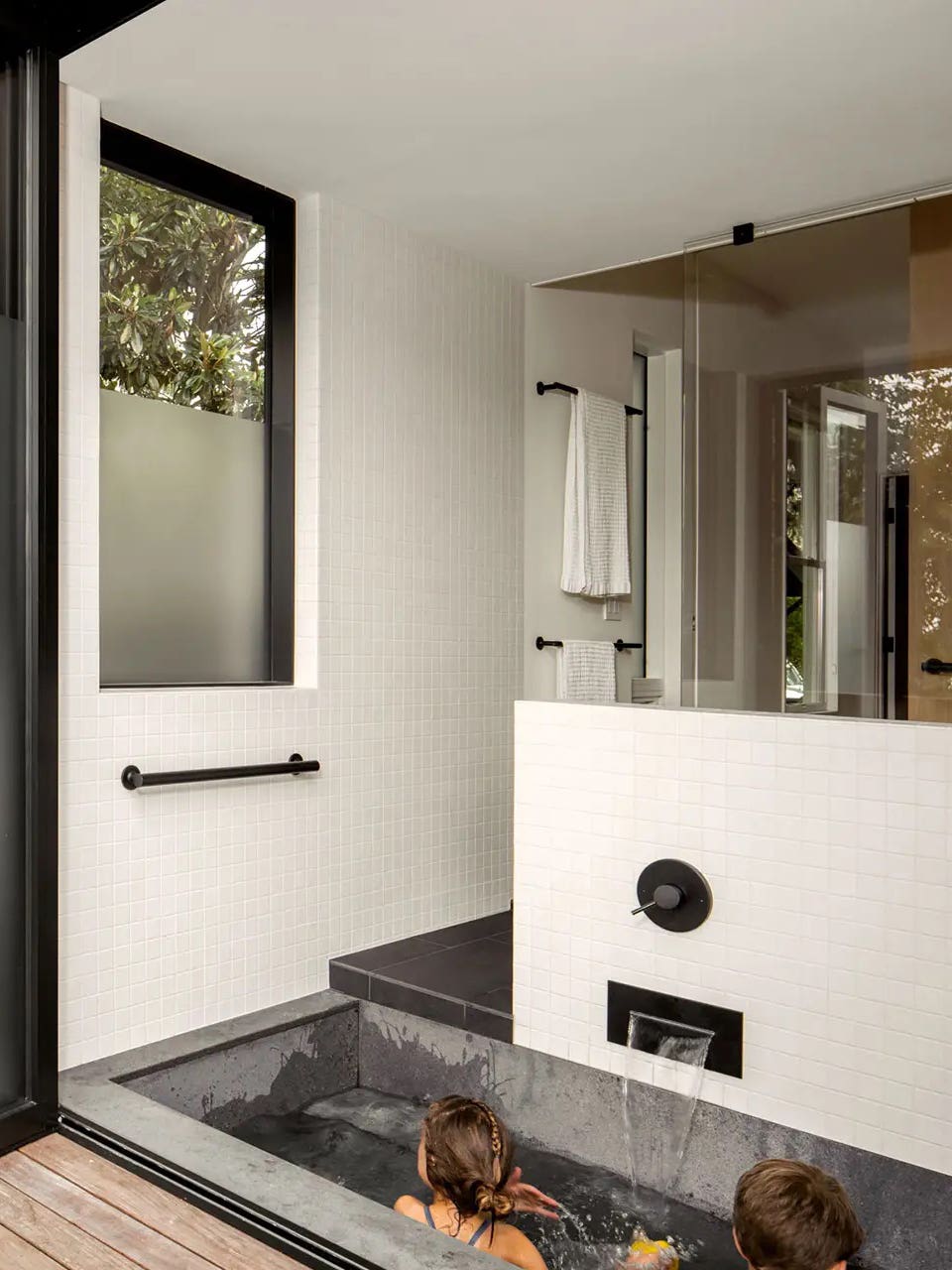 kids in indoor-outdoor tub