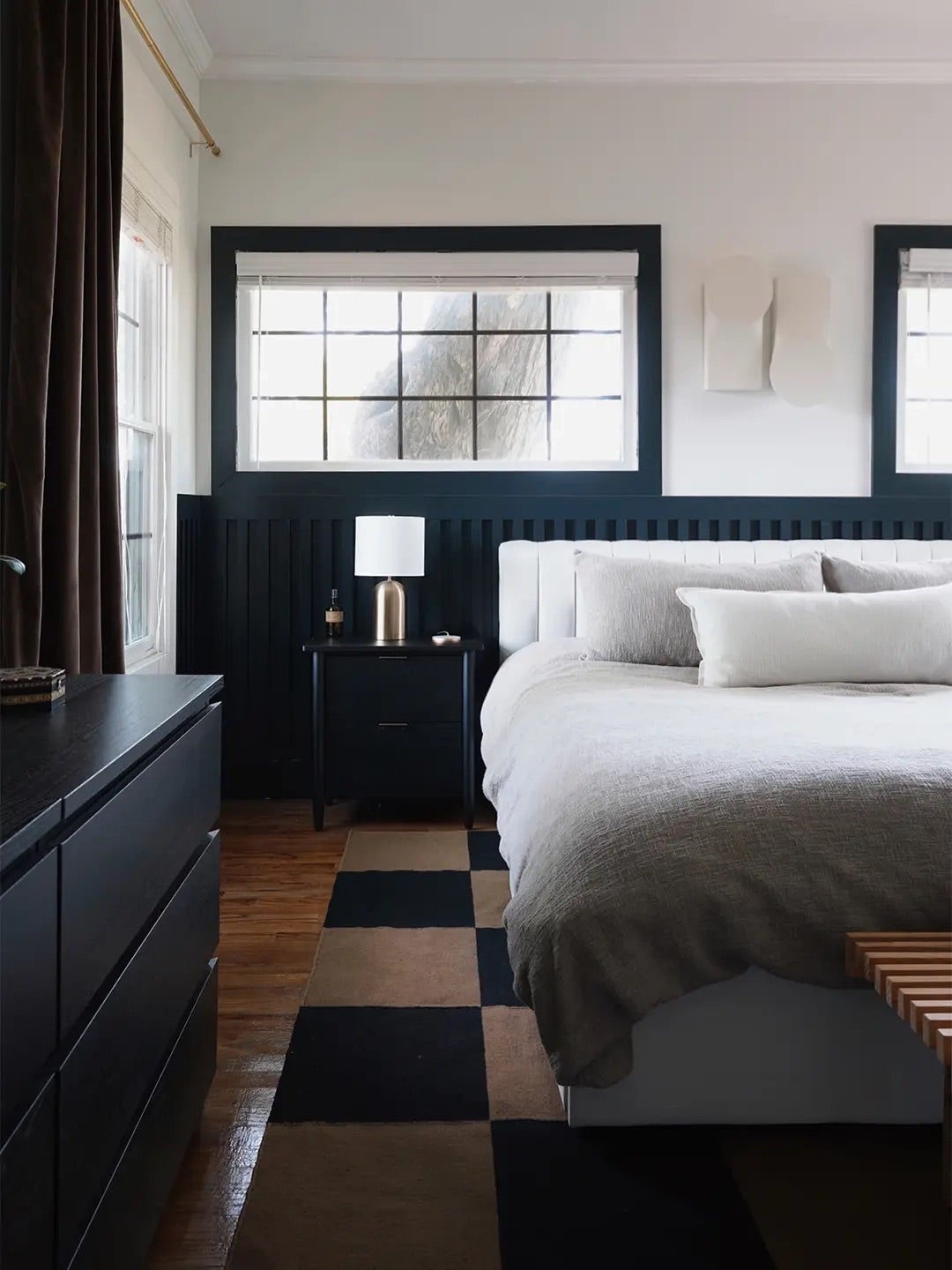bedroom with black windows