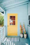 yellow door blue house