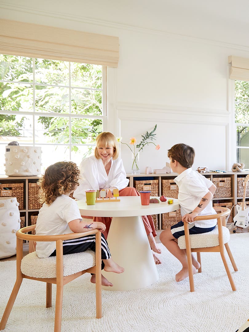 Erin Fetherston at craft table with two kids