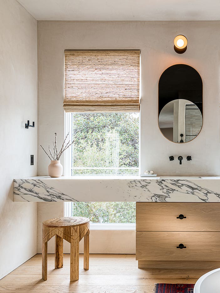 stone vanity with wood cabiinets