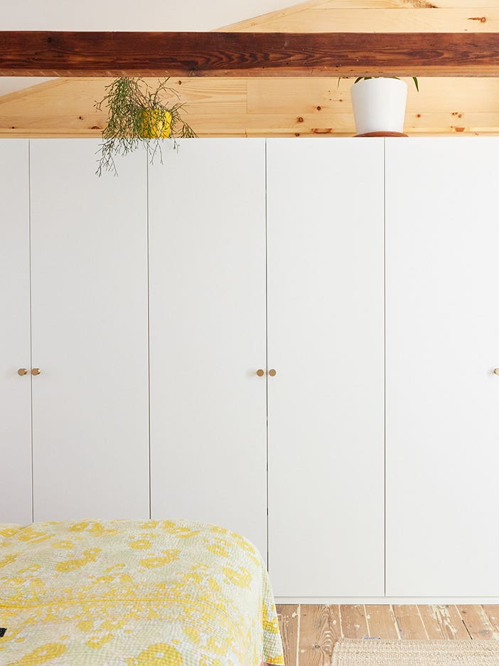 white closets in bedroom