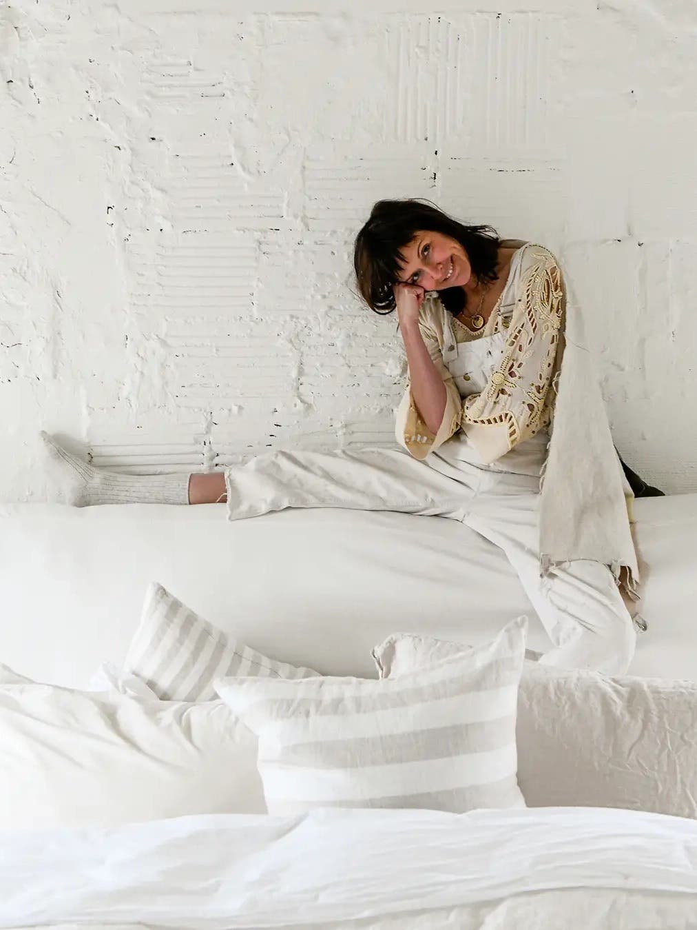 woman in white sweater