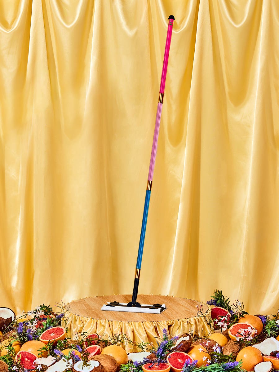 Staff's The Mop on gold background