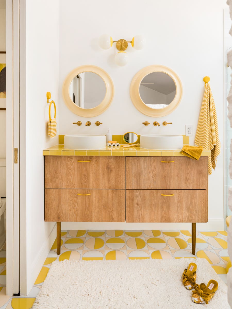 retro yellow bathroom with patterned floor tile