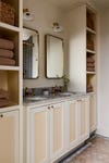 cream-yellow vanity cabinets
