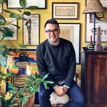 portrait of Benjamin Reynaert in front of gallery wall