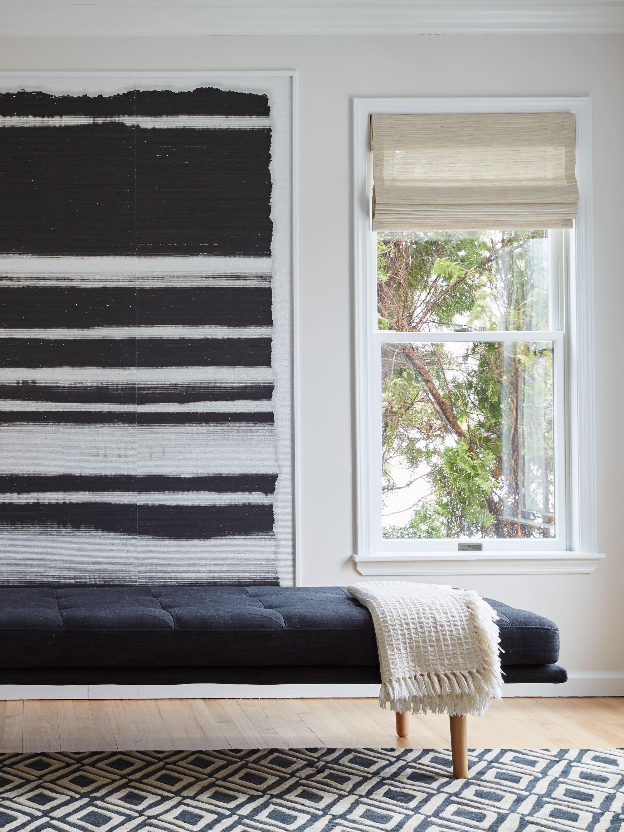 A Refined Bohemian Home Embraces Peaceful Prints and Statement Art