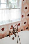 floral red tile bathroom