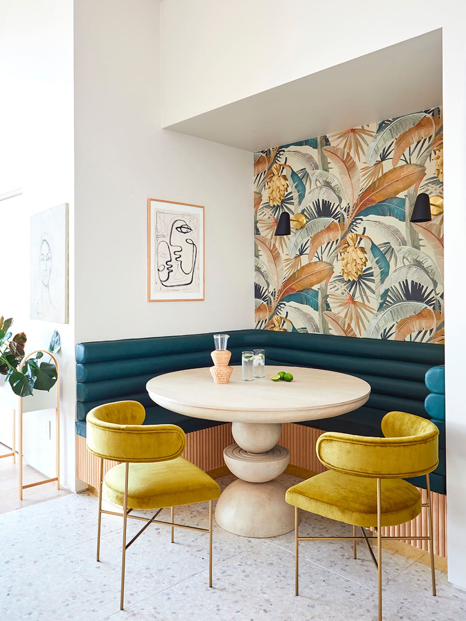 curved table and yellow dining chairs