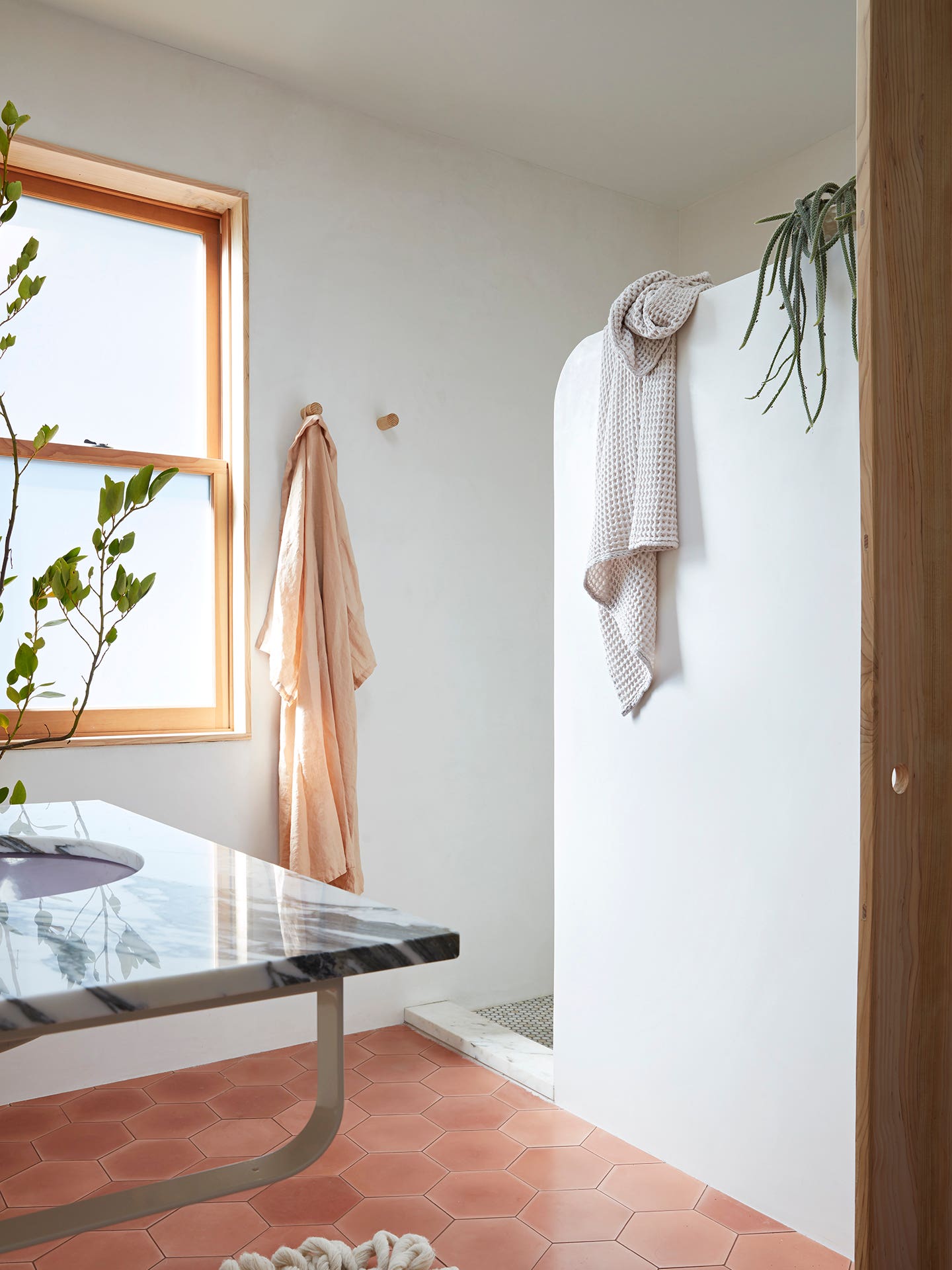 bathroom with terracotta floors