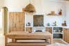 white and wood kitchen with earthy materials