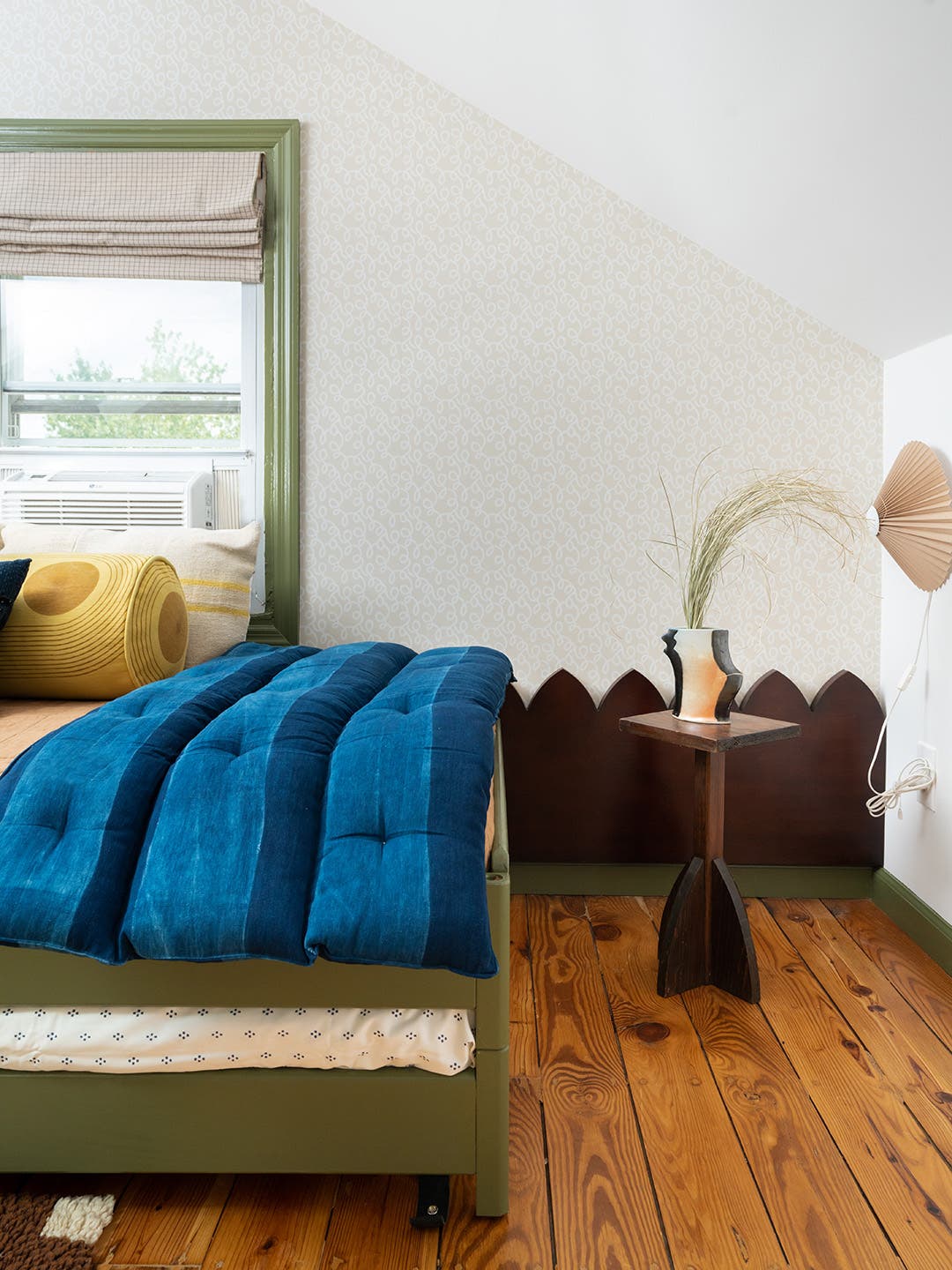 blue quilt on bed