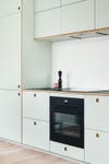 Mint green kitchen cabinets