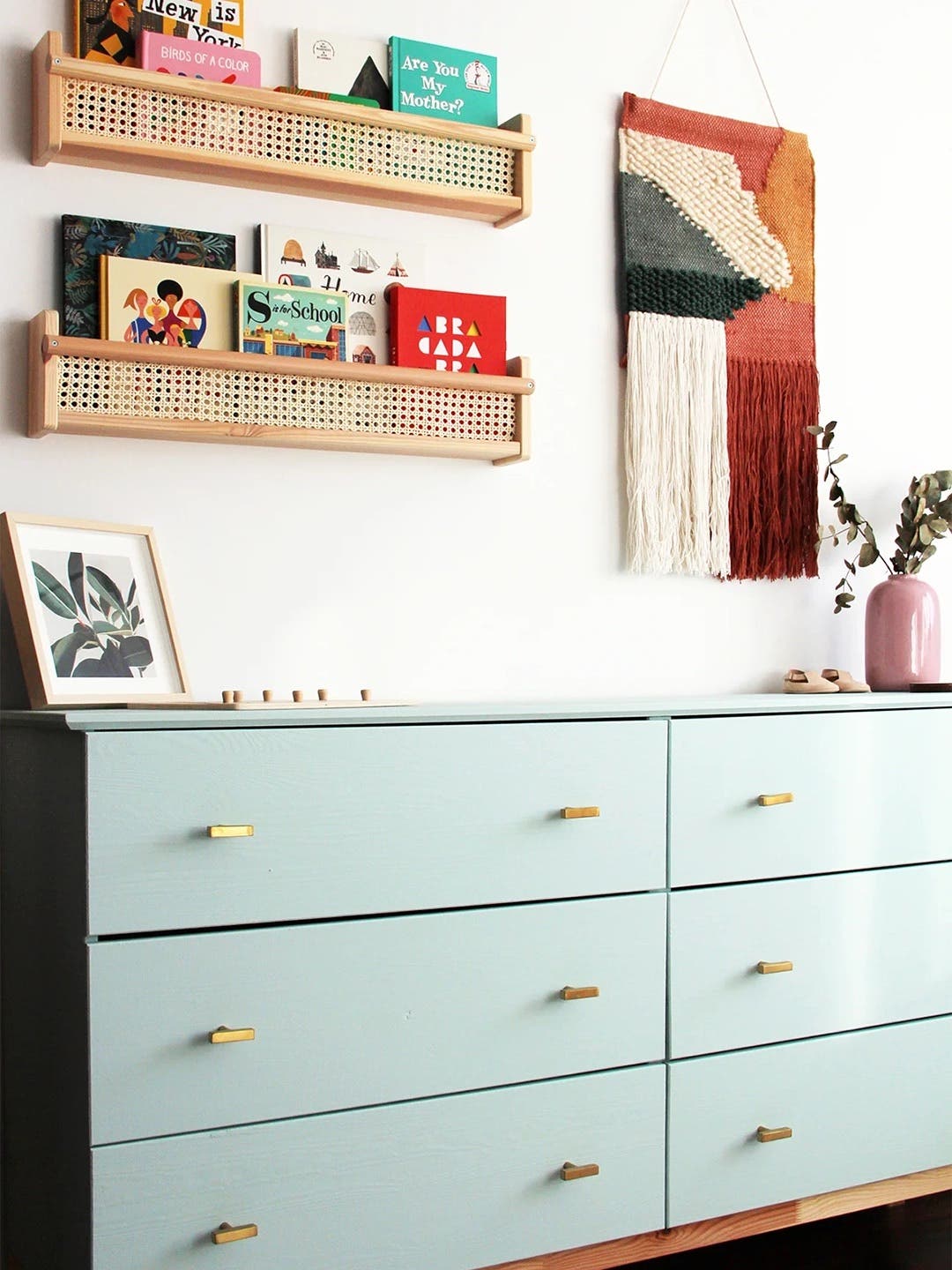 nursery with cane and wood IKEA wall shelves