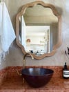 powder room with red counters