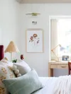 Teen room with wicker lamp and white shiplap lining the wall. 